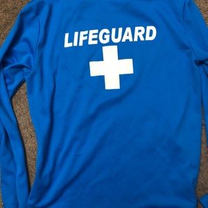 Set of 2 used, fair condition lifeguard shirts